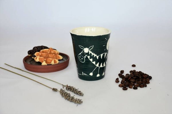 Porseleinen blauwgroene mok met zebra