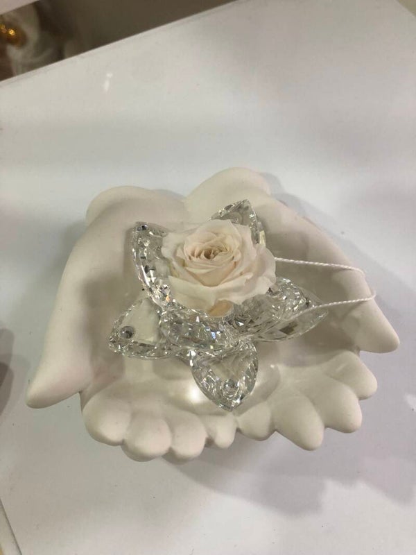 Mani con fiore di sbaroski