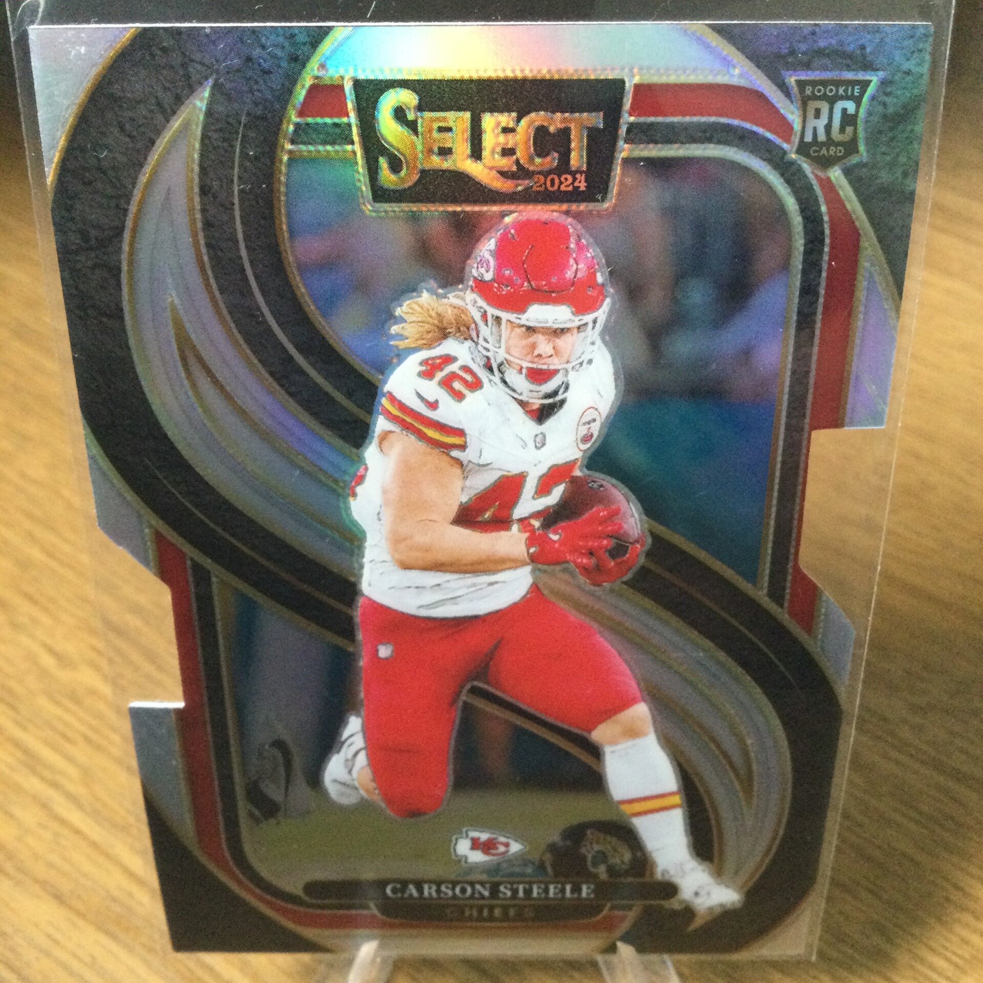 CARSON STEELE RC - 2024 PANINI SELECT - PREMIER LEVEL SILVER PRIZM DIE-CUT #142 - KANSAS CITY CHIEFS