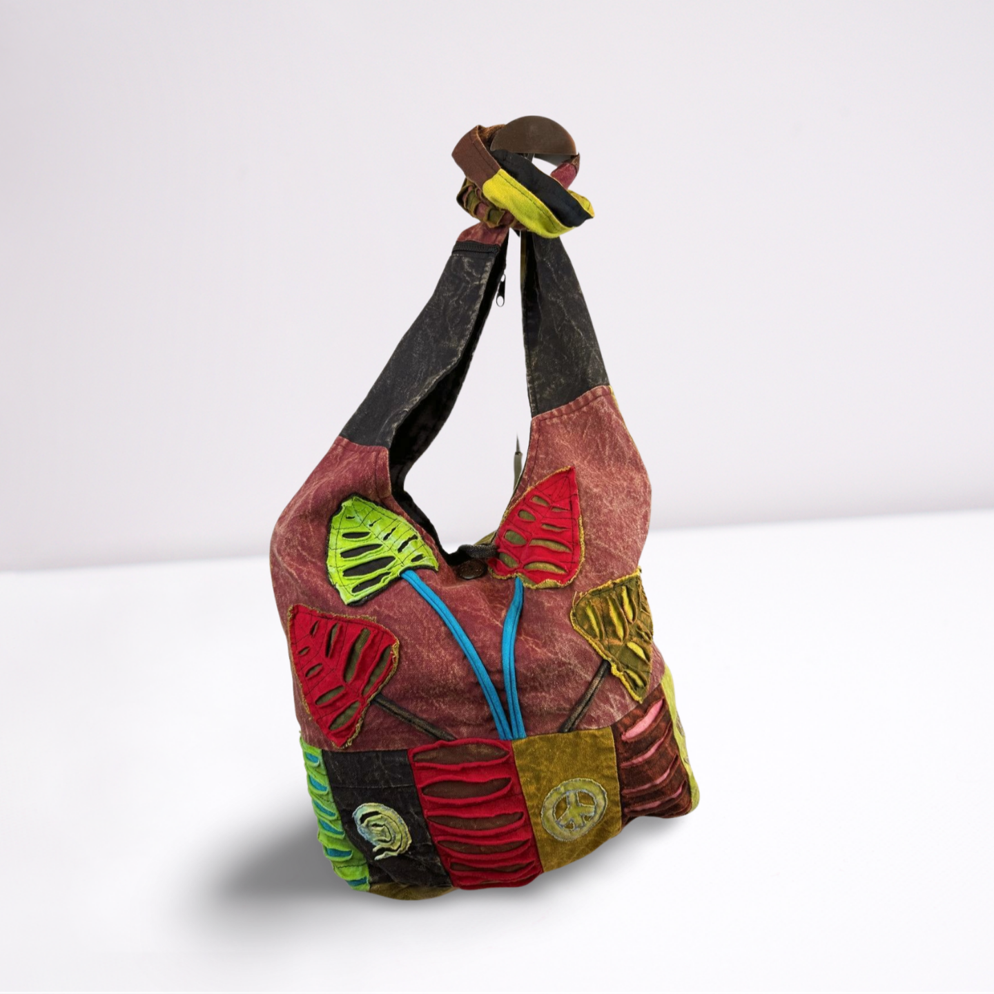 Hippie schoudertas met patchwork details