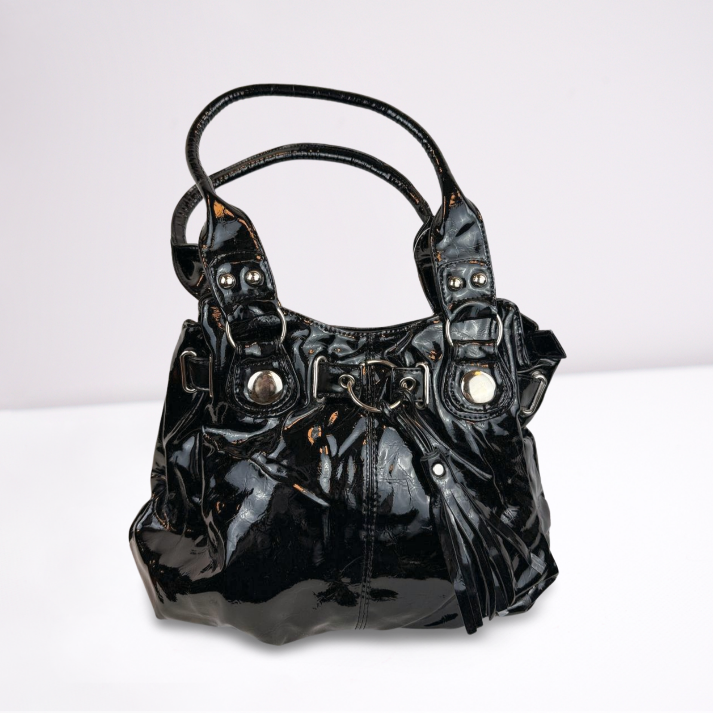 Zwarte lakleren handtas met franjes