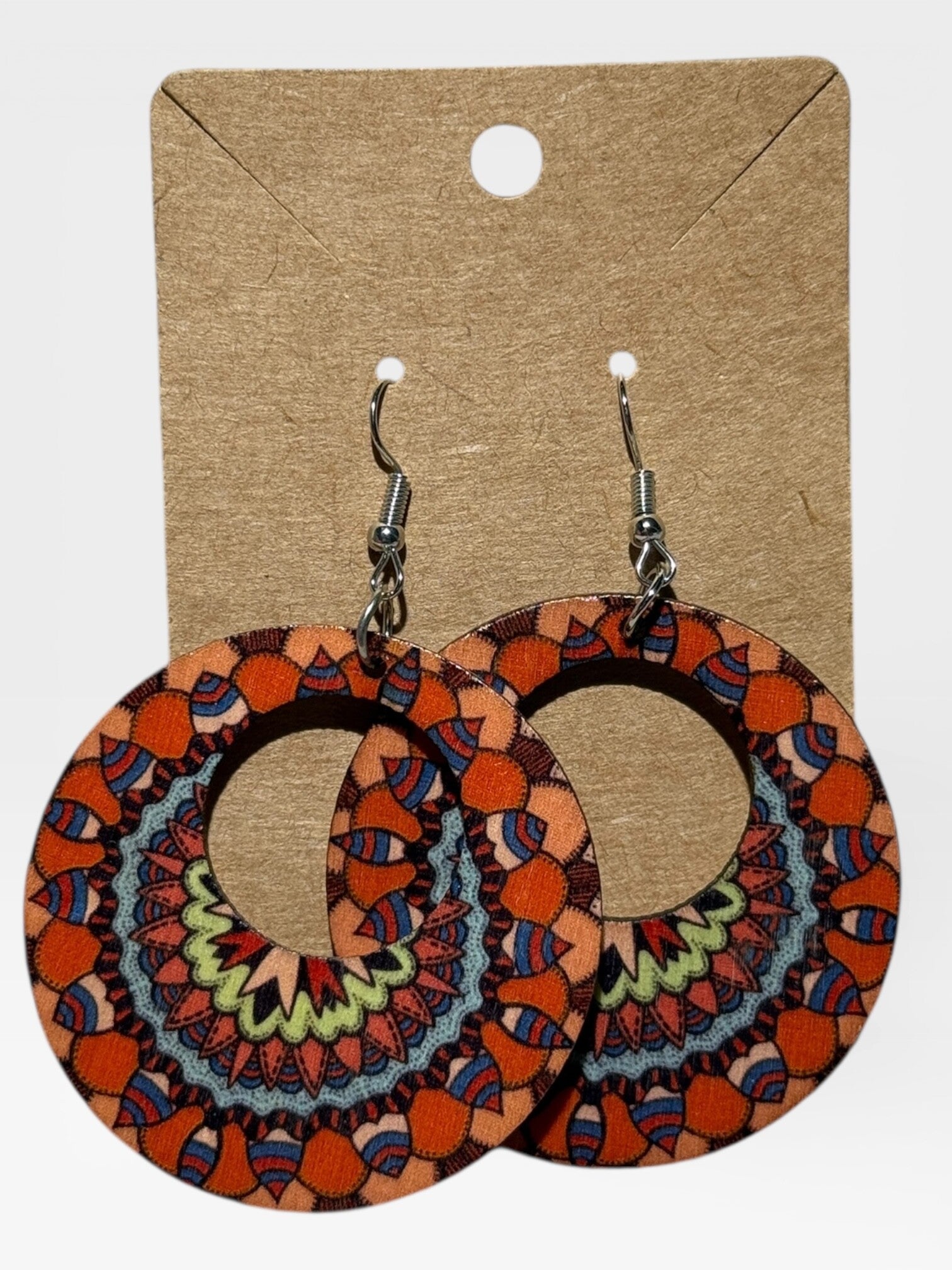 Oranje ronde oorbellen met patroon