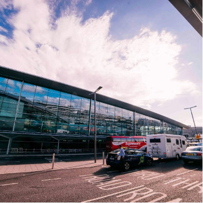 London City Airport terminal with shuttle van — premium transfers from Godalming starting at £140