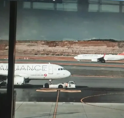 Airport Tarmac with Star Alliance Planes – Book Reliable Airport Transfers from Godalming to Heathrow, Gatwick & More