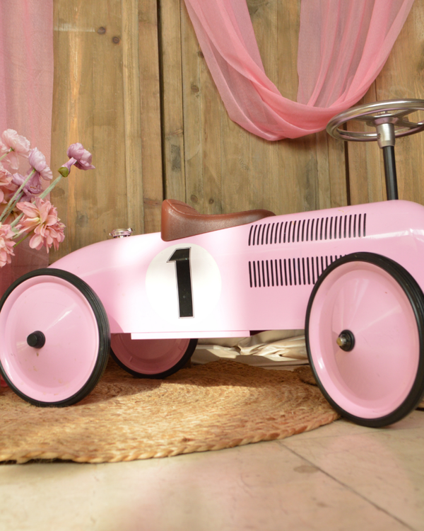 Roze loopauto