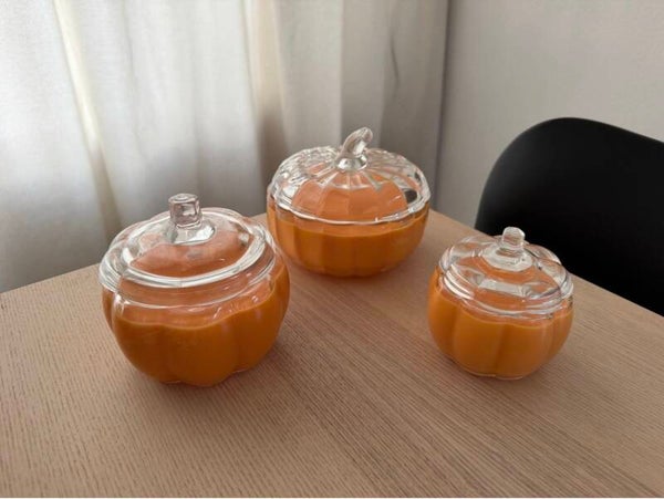 Kaars in pompoen glas