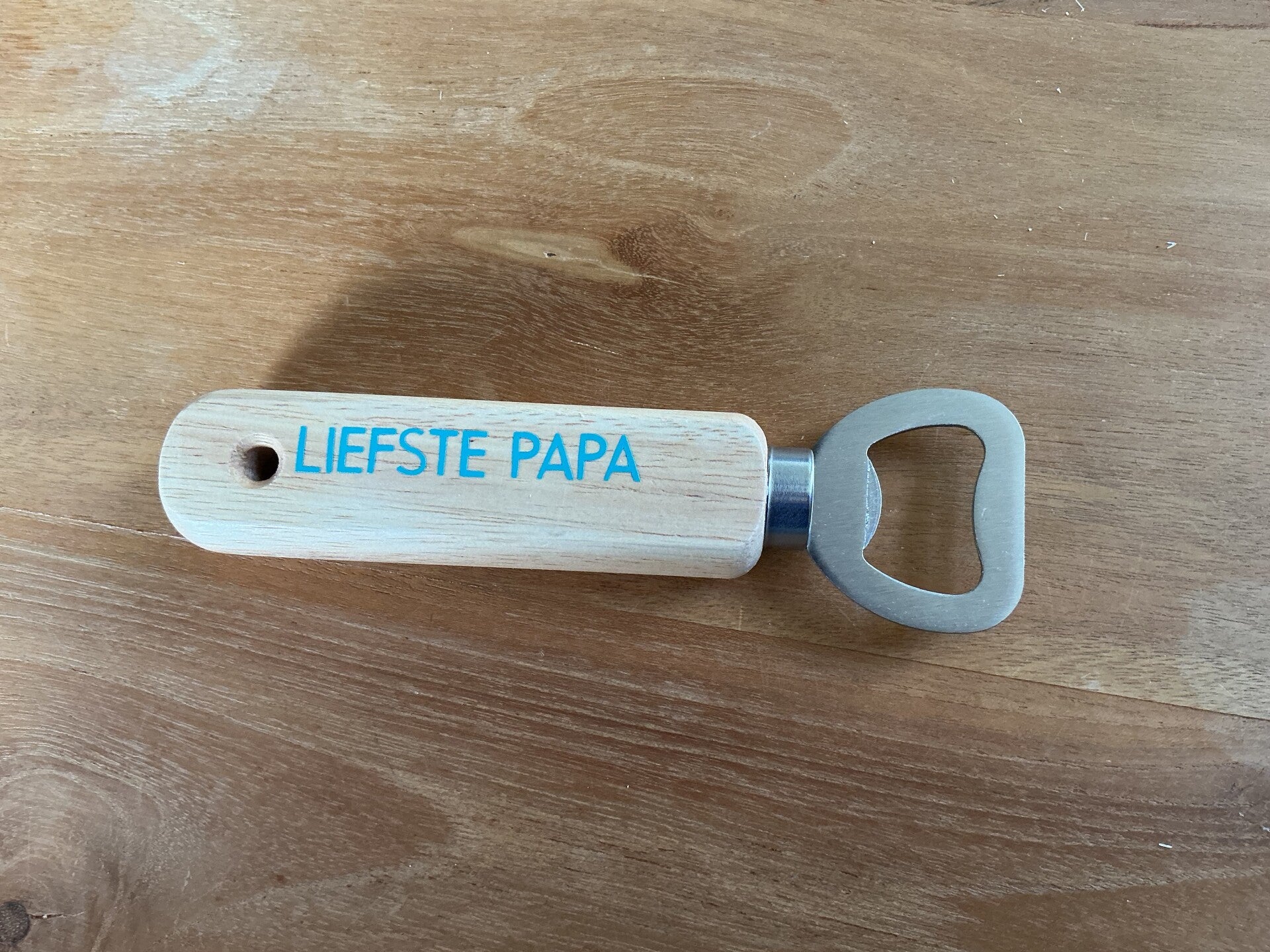 Mooie flesopener met tekst