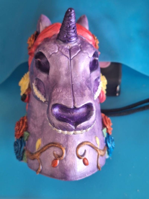 Purple scull unicorn