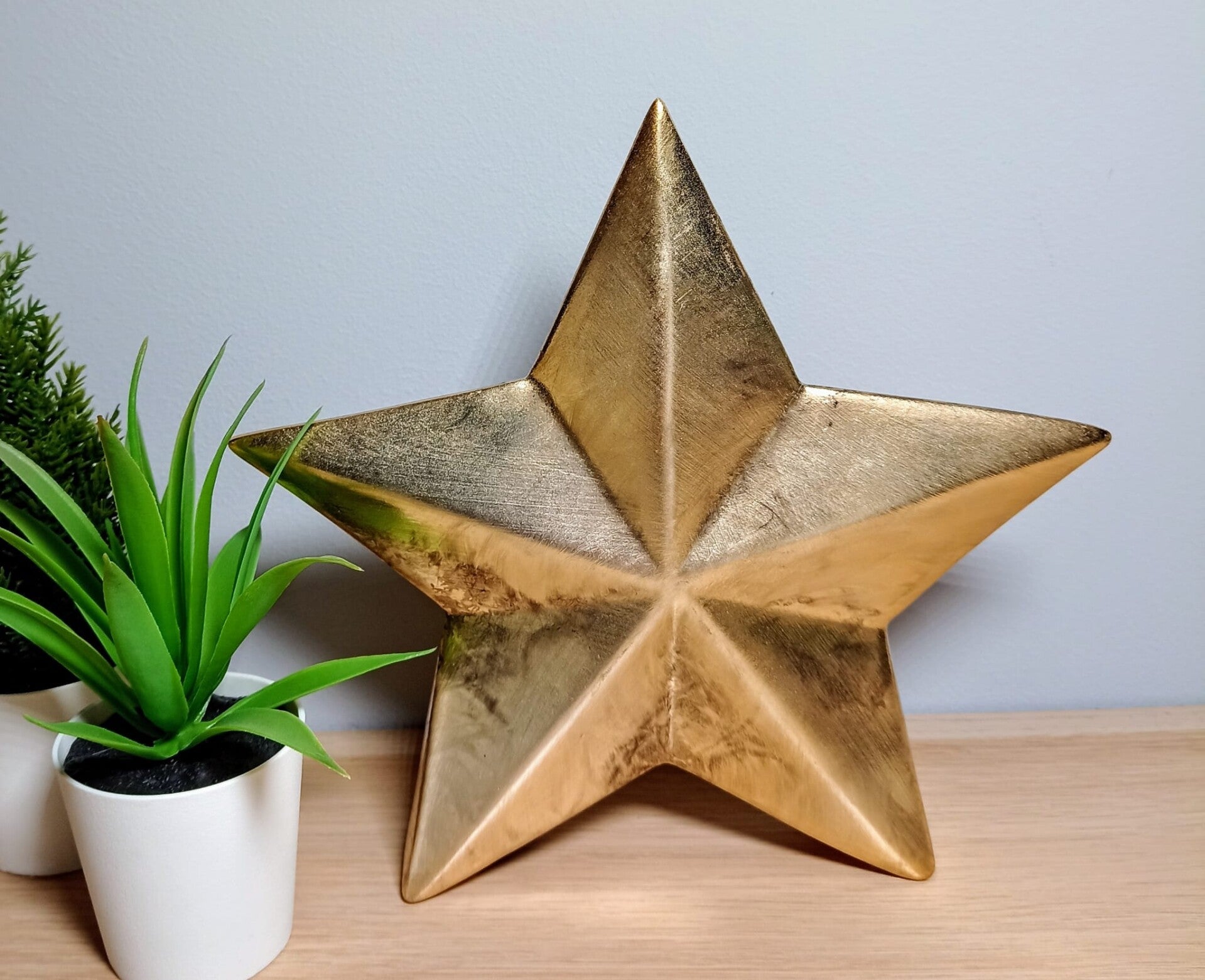 Decoratie ster goud.
