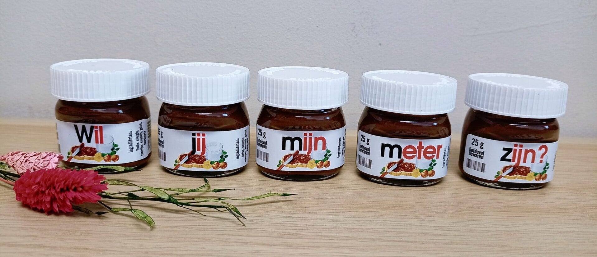 Mini Nutella potjes Meter.