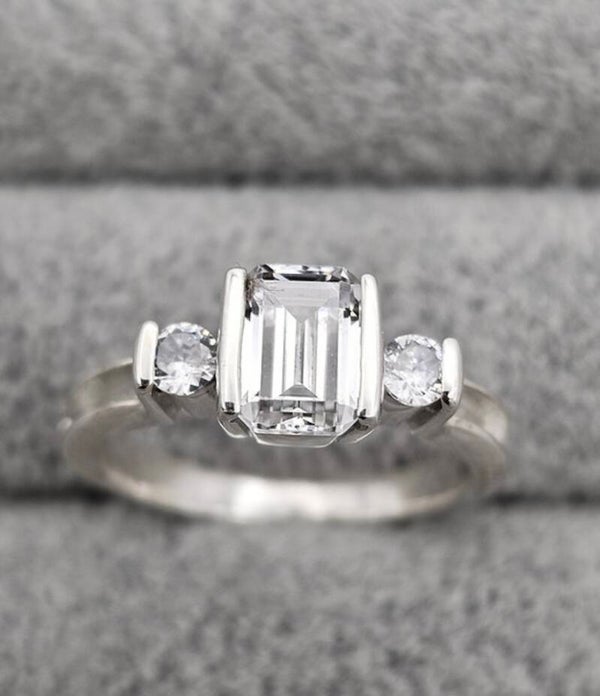 Emerald cut triple CZ ring