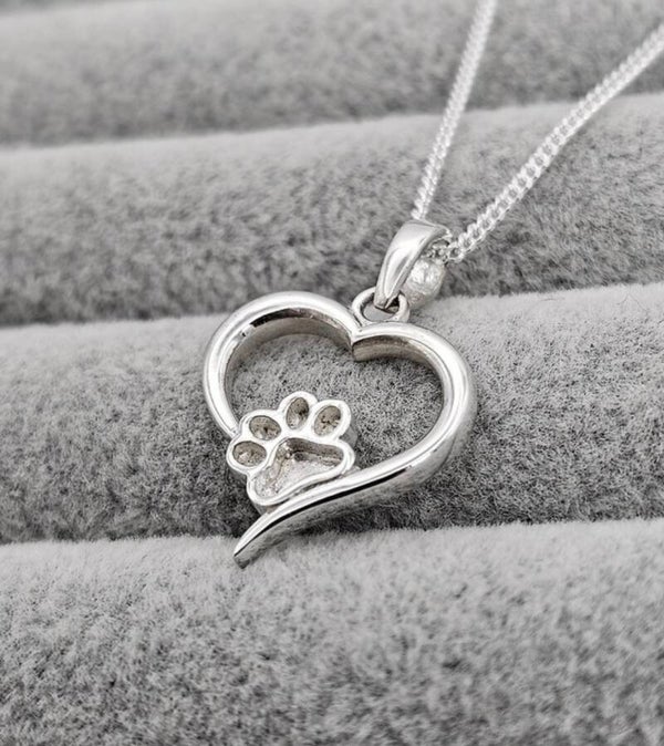 Paw print hollow heart pendant