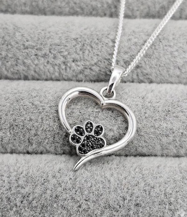 Paw print hollow heart pendant