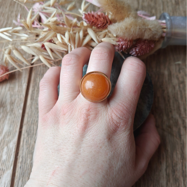 Ring O1: verstelbare oranje bolvormige ring