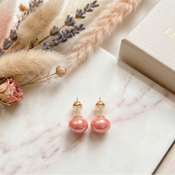Oorbel KLEIN 63 studoorbel donker roze