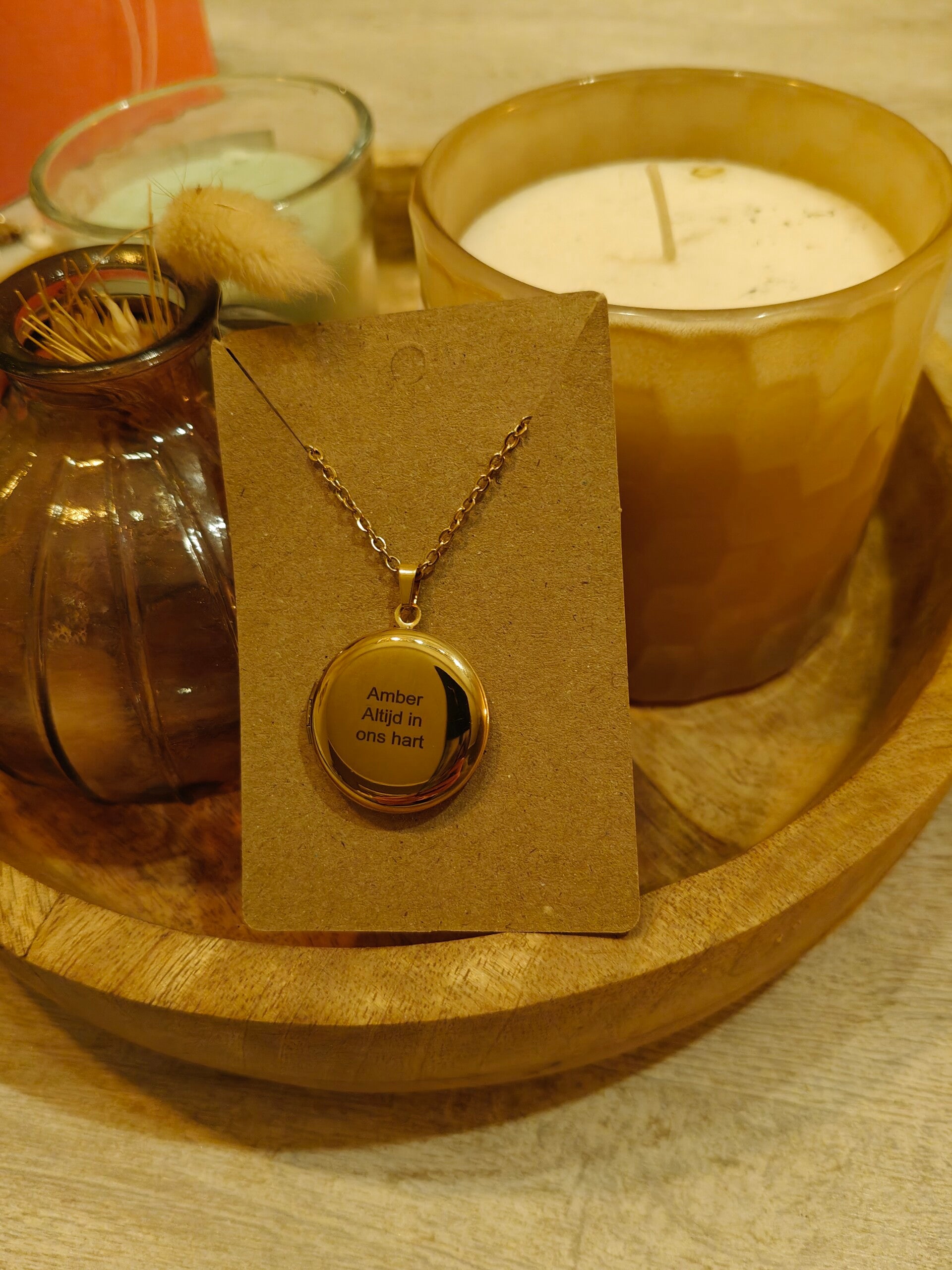 Gegraveerde medaillon met eigen tekst en eigen foto