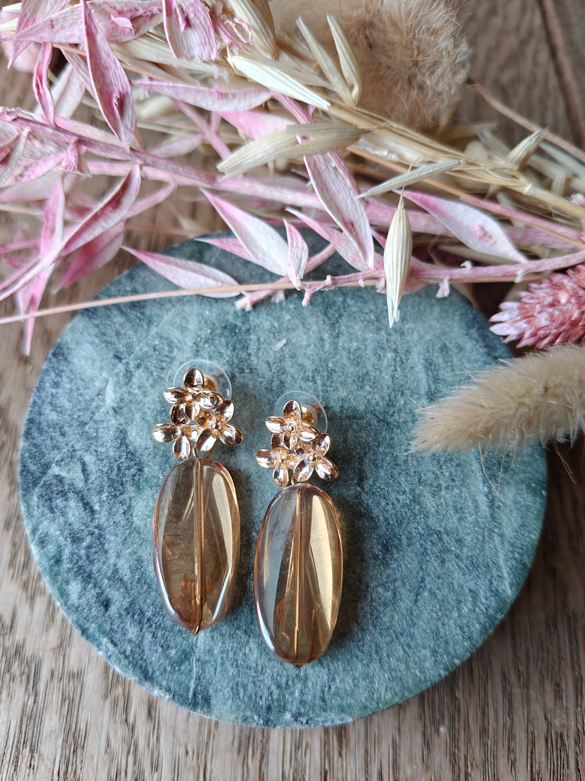 Oorbel: glimmende transparant bruine oorbellen