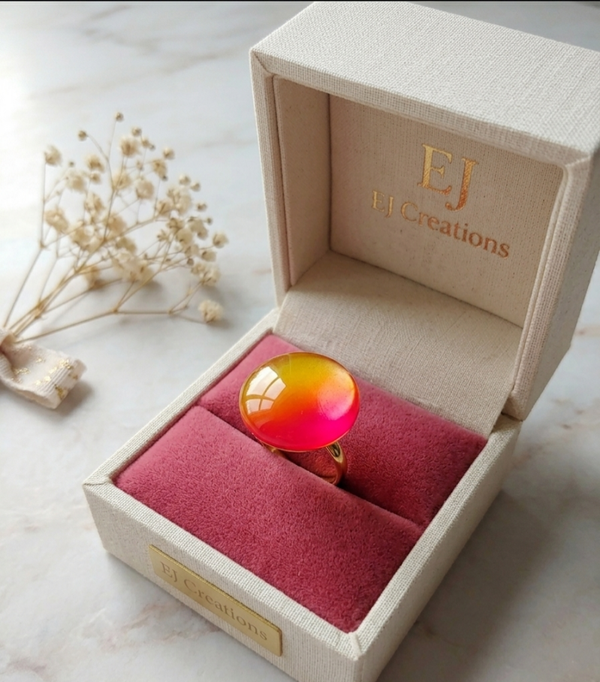 Ring: oranje en roos/rode ring