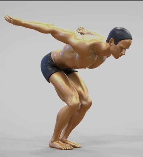 Male Swimmer is Diving