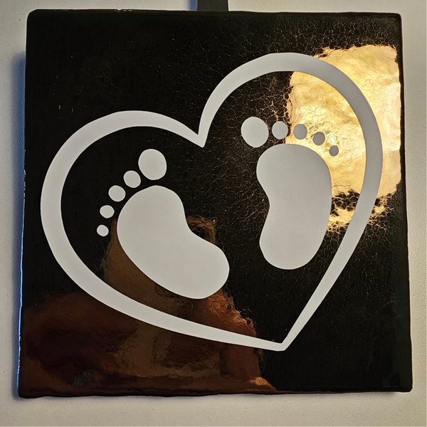 Tegel baby voetjes