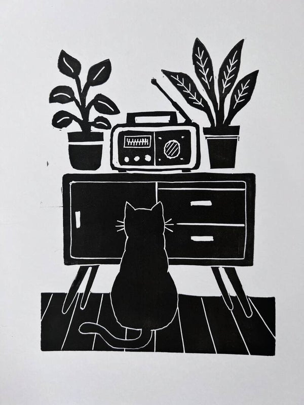 linoprint kat luistert radio