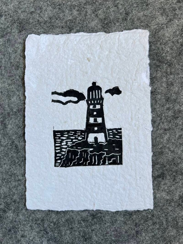Linoprint “vuurtoren” op handgeschept papier