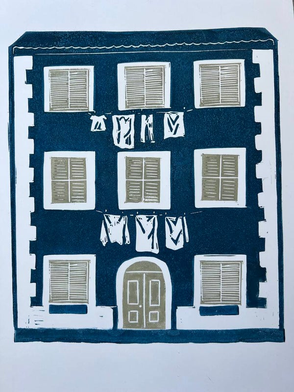 Linoprint Italiaans huis met wasgoed