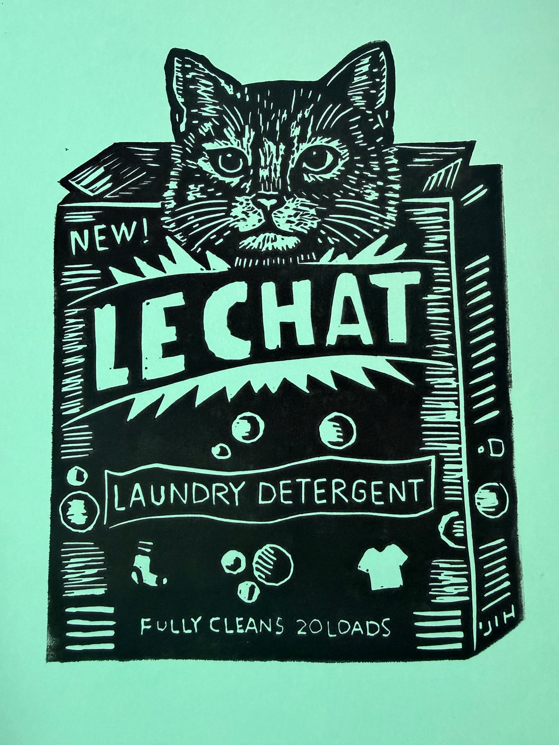 Linoprint kat in wasmiddelpak