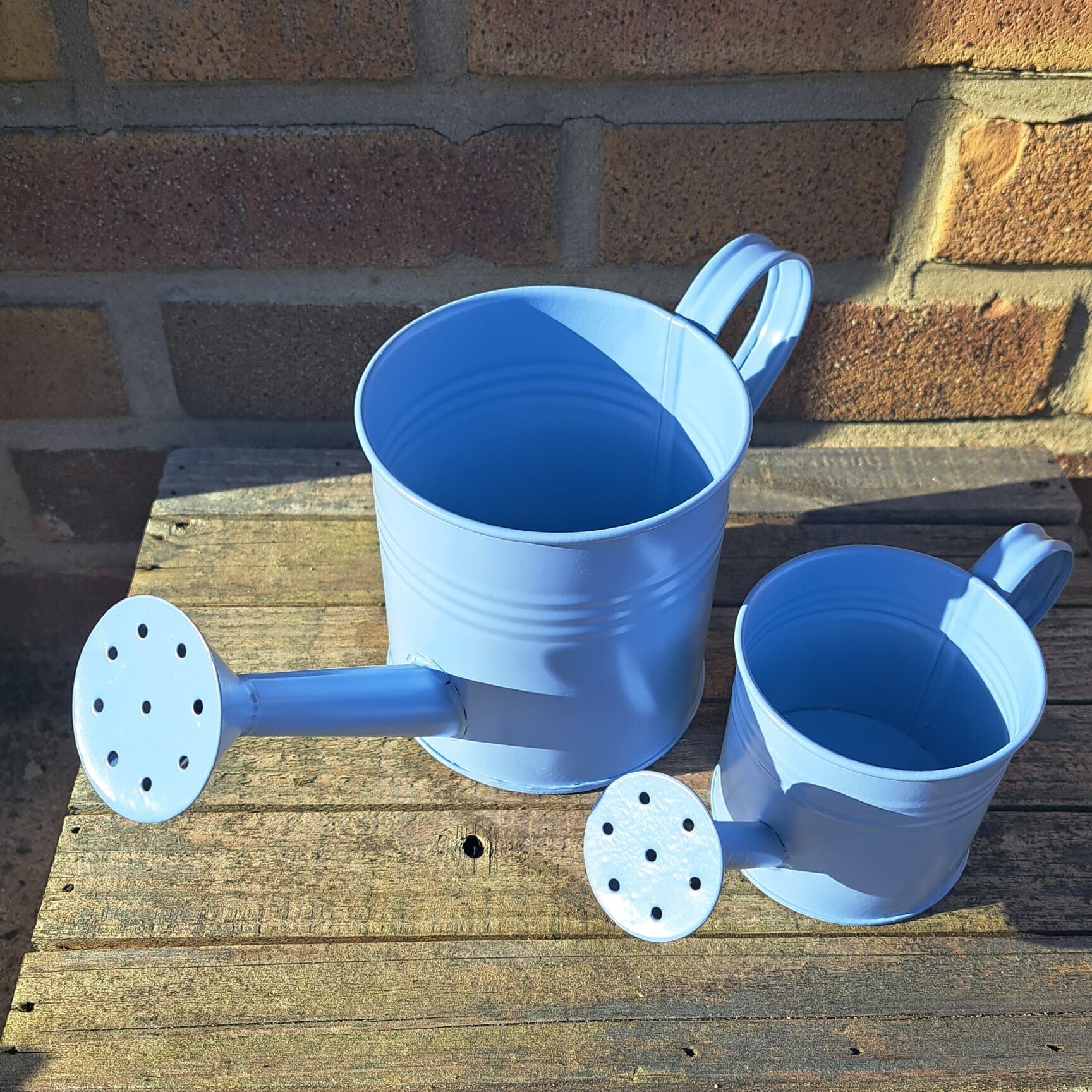 Gieter set klein en groot 7 cm en 11 cm blauw