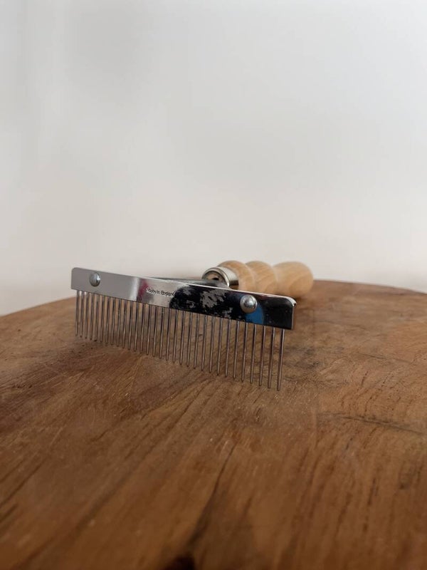 Herderhark met houten handvat