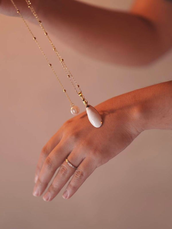Collier de dos avec pendentif avant