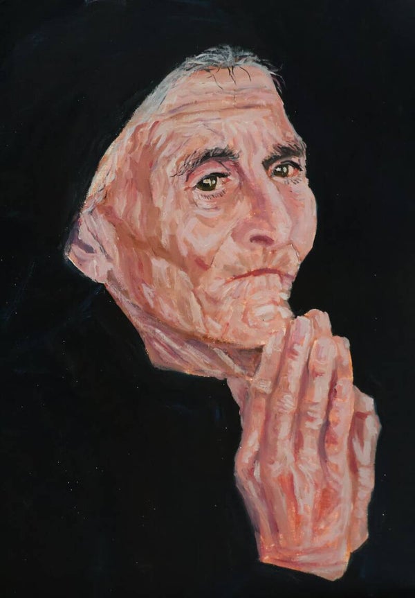 Biddende oude vrouw
