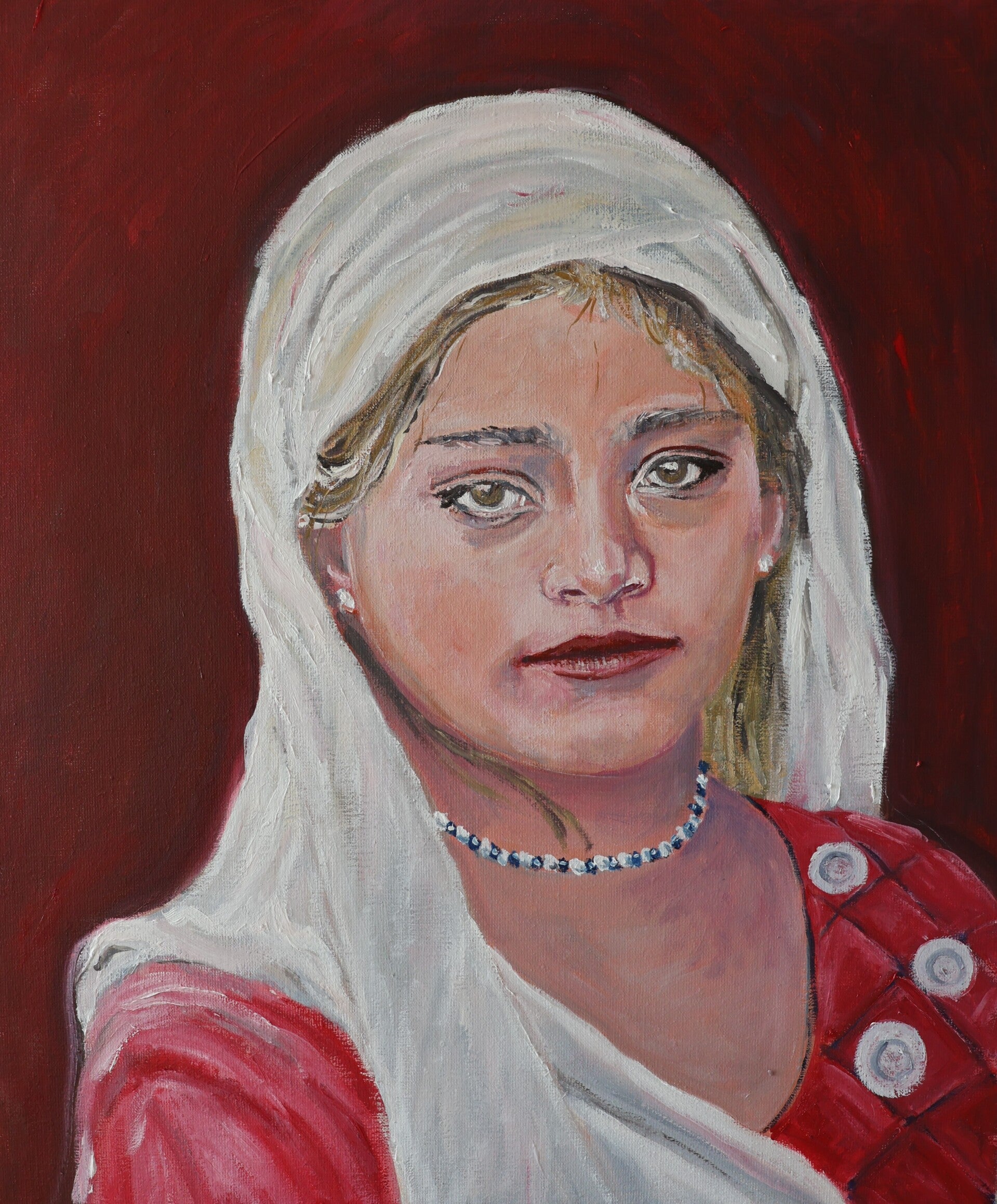 Jonge vrouw ,et witte hoofddoek