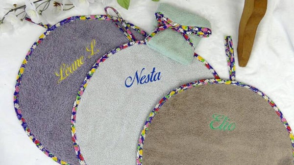 Serviette maternelle ronde éponge coton finition biais imprimé