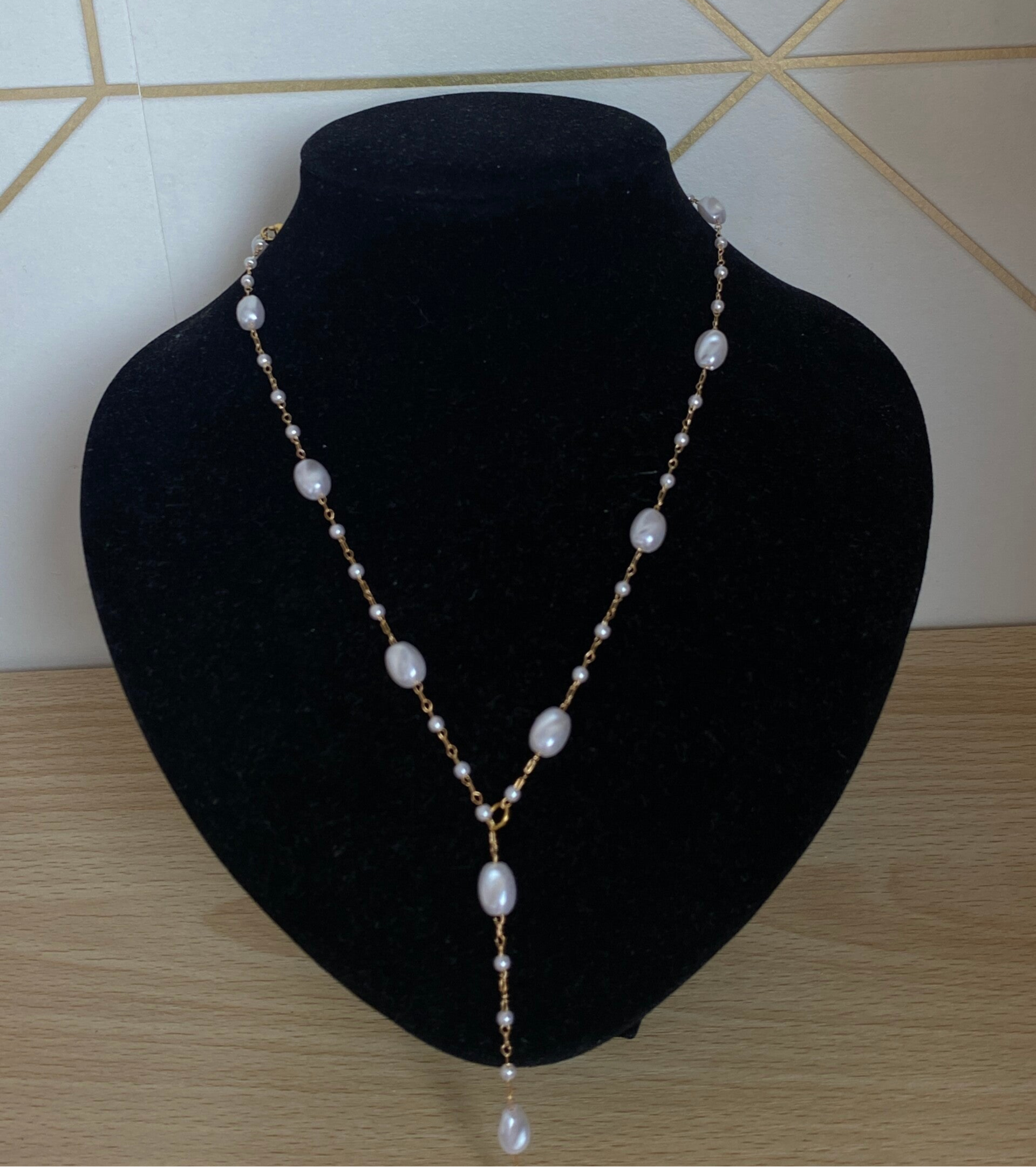 Long pearl necklace