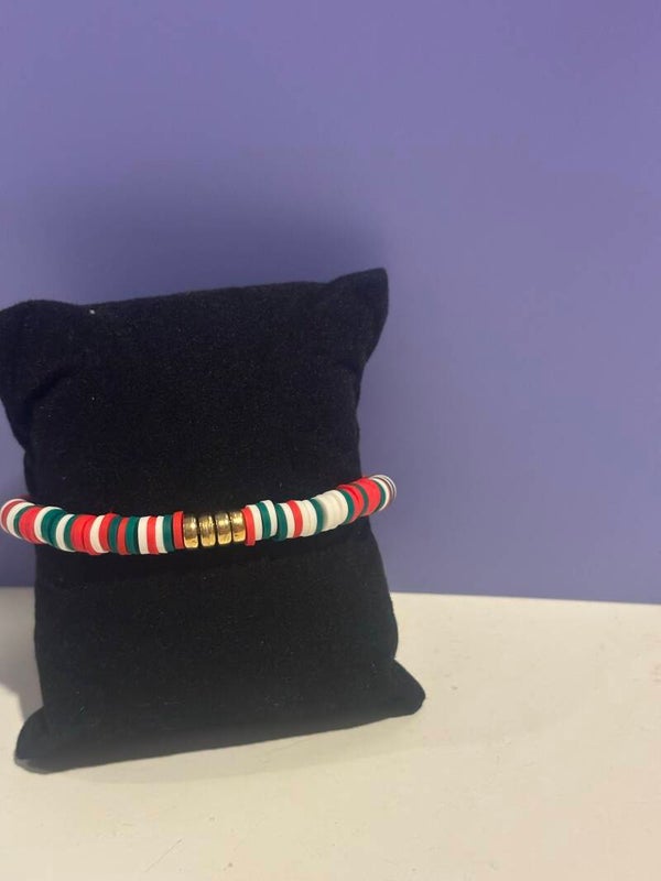 armband - groen met rood , met bedel