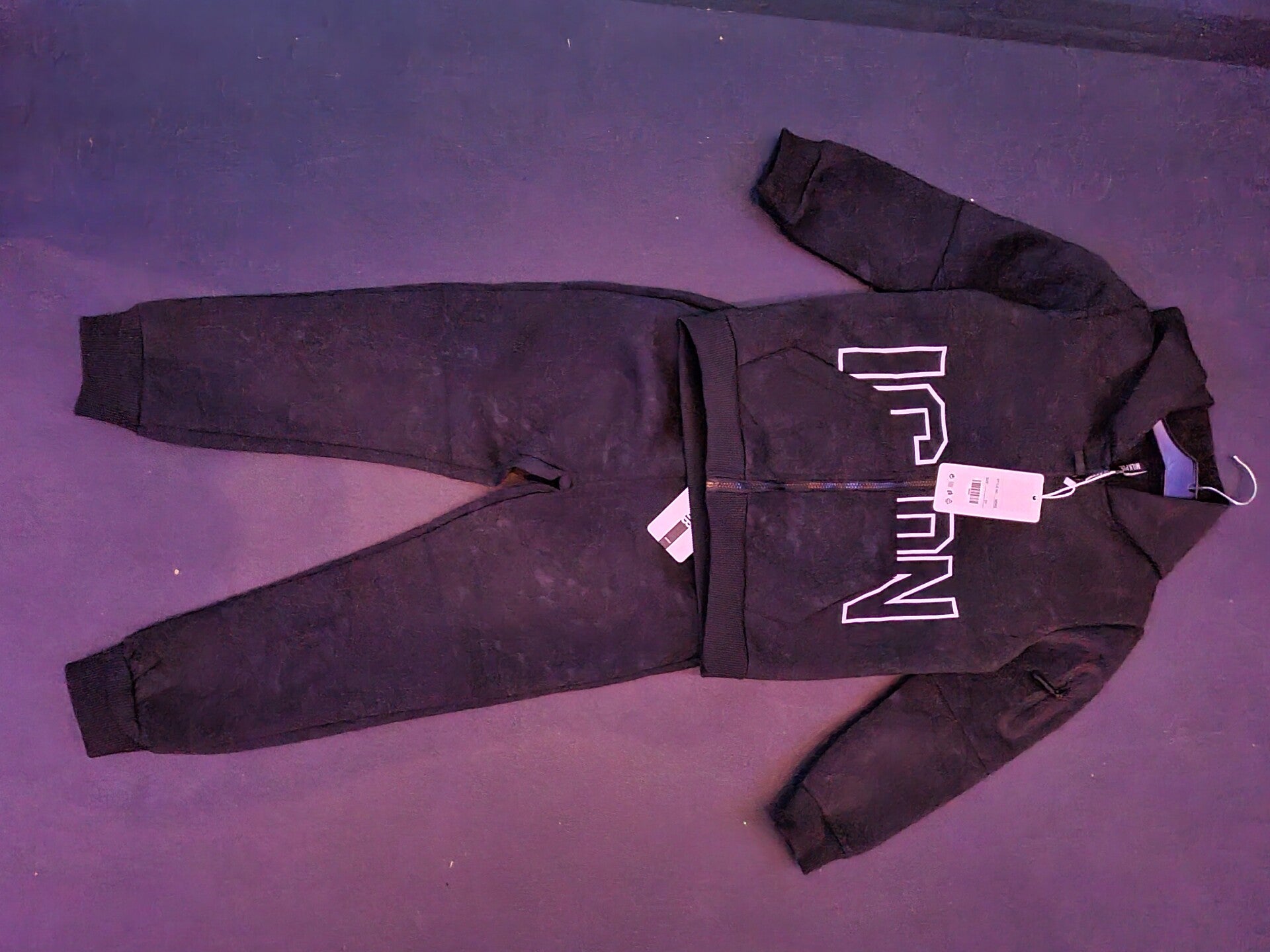 Icon jongenspakje zwart