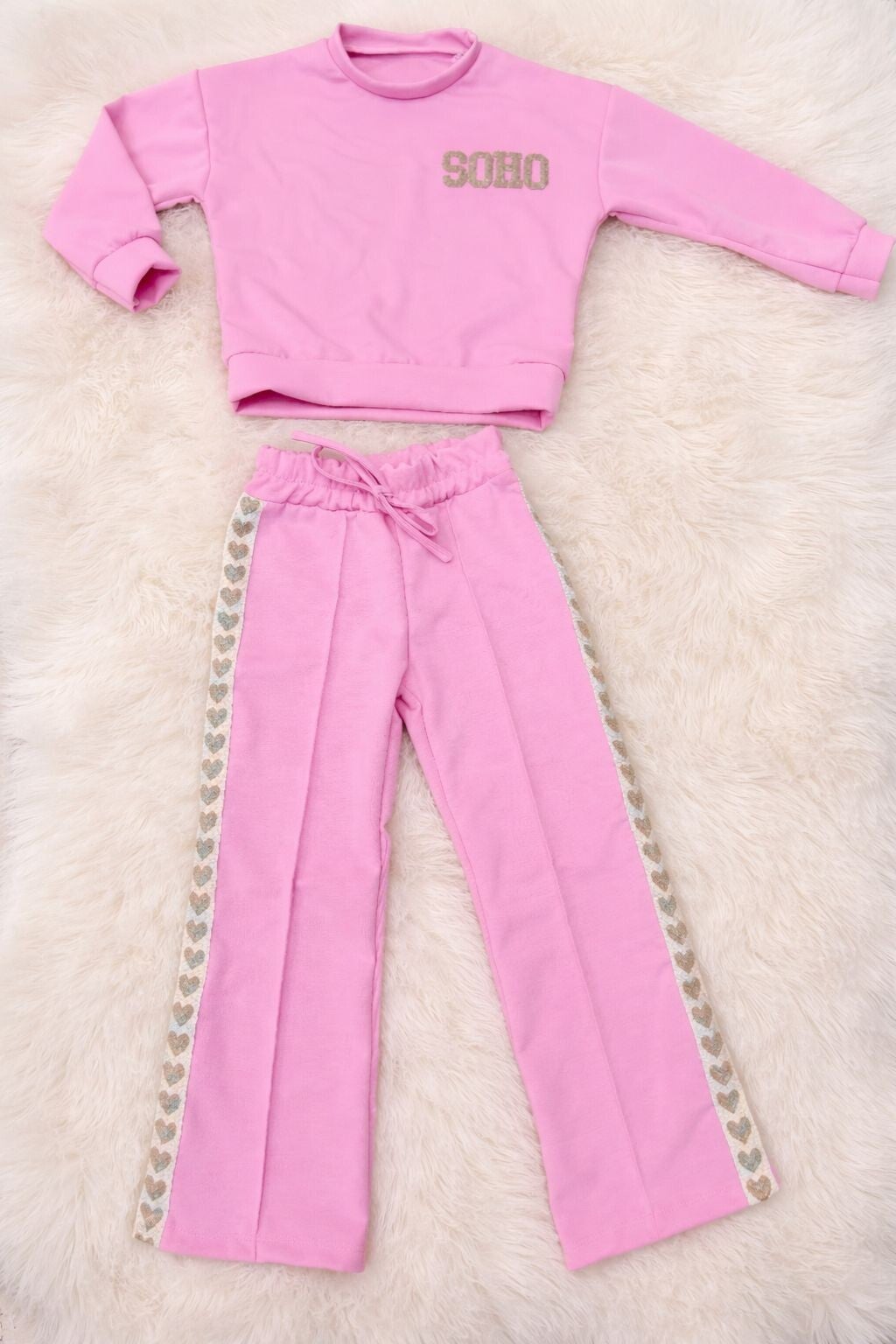 roze vrijetijdspak met hartjes