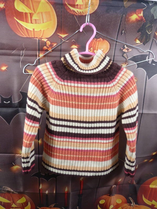 Pull col roulé
