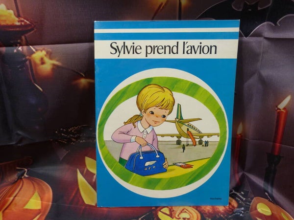Sylvie prend l'avion