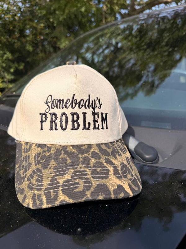 Somebody's Problem Trucker Hat