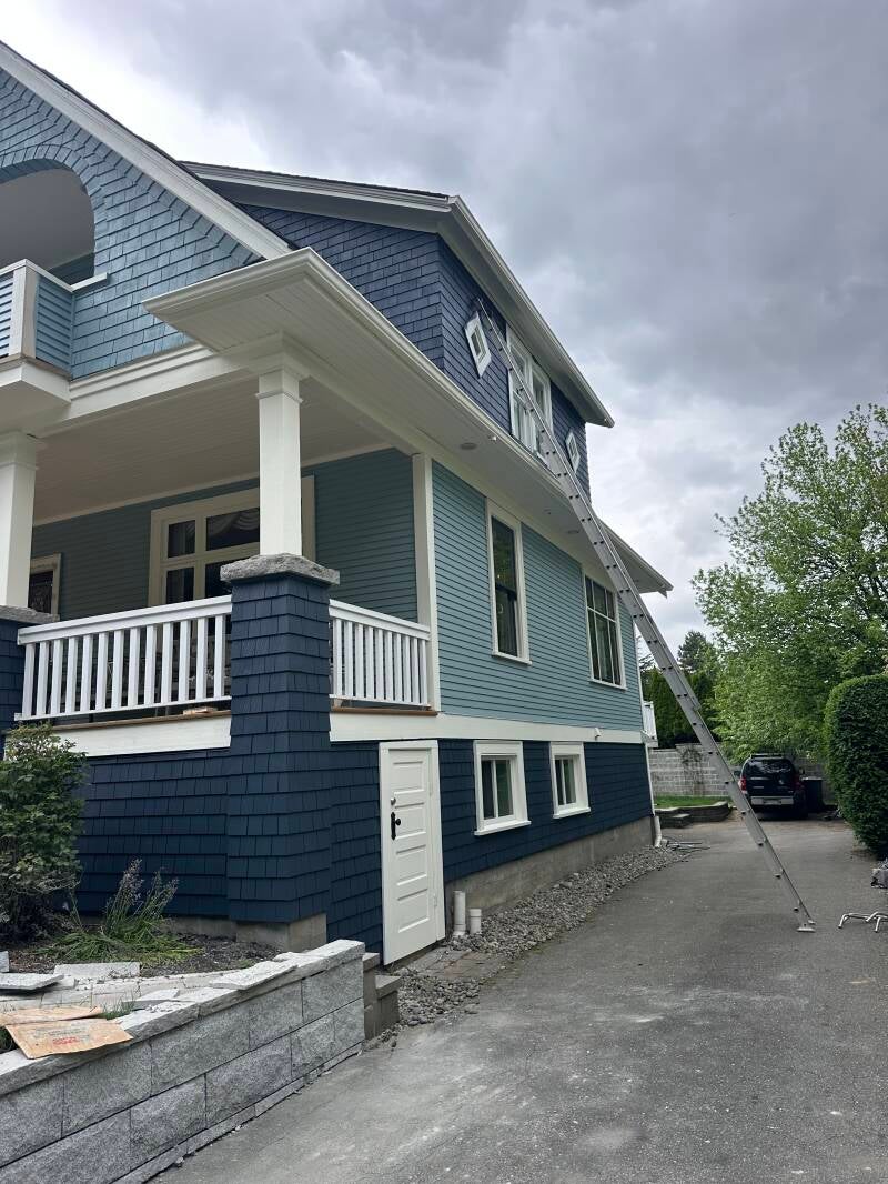 Residential exterior painting in Vancouver with refreshed siding, doors, and trim