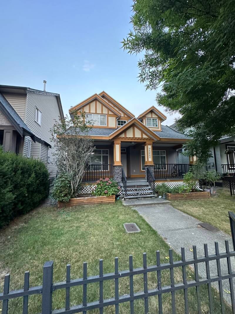 Before exterior house painting at a residential property in Langley, BC.
