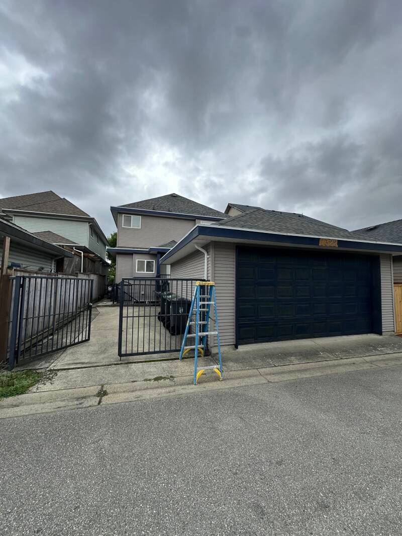 Completed exterior house painting project in Langley, BC by local exterior painters Tidy Brush Painting.
