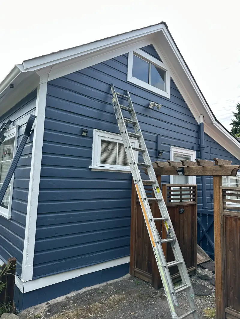 Exterior painters near me refreshing residential siding, trim, doors, and fascia