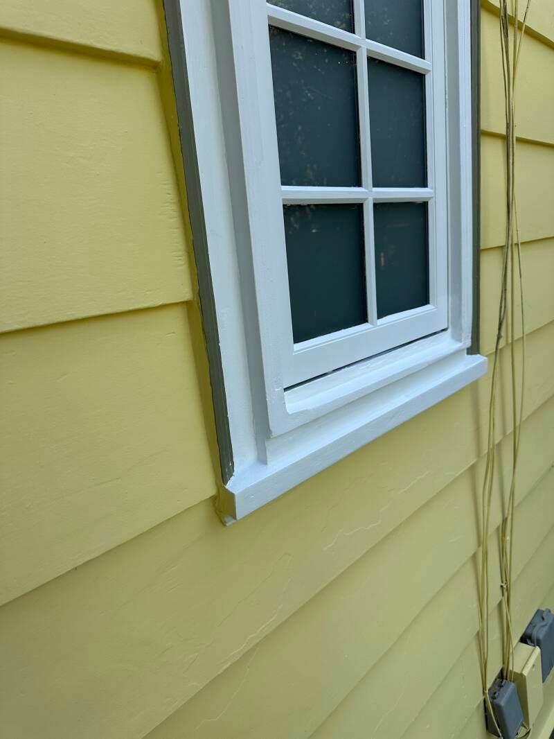 rotten window sills is fixed by bondo then prime and paint it to look brand new