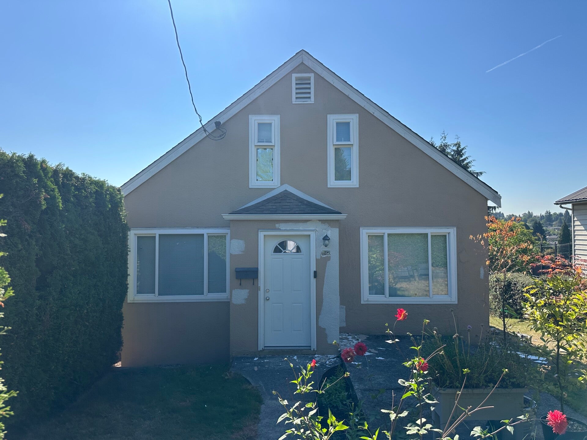 New Westminster house before exterior painting and preparation by professional house painters at Tidy Brush Painting.