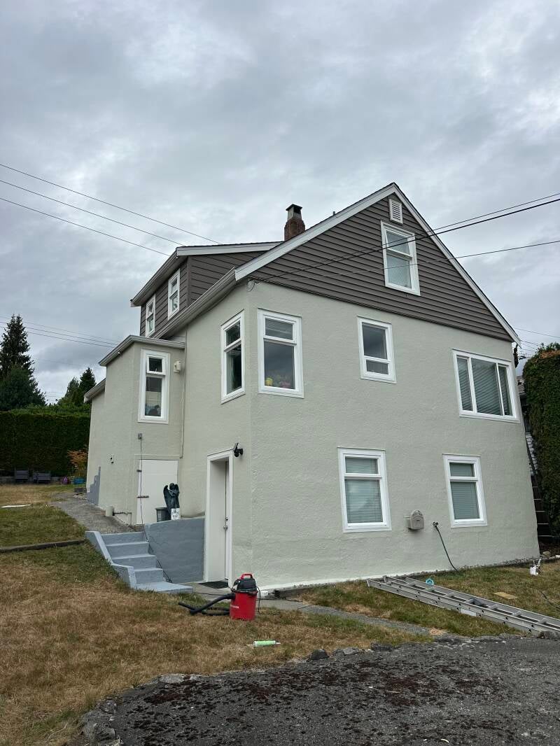 Completed New Westminster exterior painting project by Tidy Brush Painting, transforming the home's overall exterior appearance.