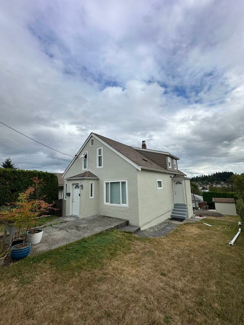 Newly painted residential exterior in New Westminster following professional preparation and exterior painting by Tidy Brush Painting.
