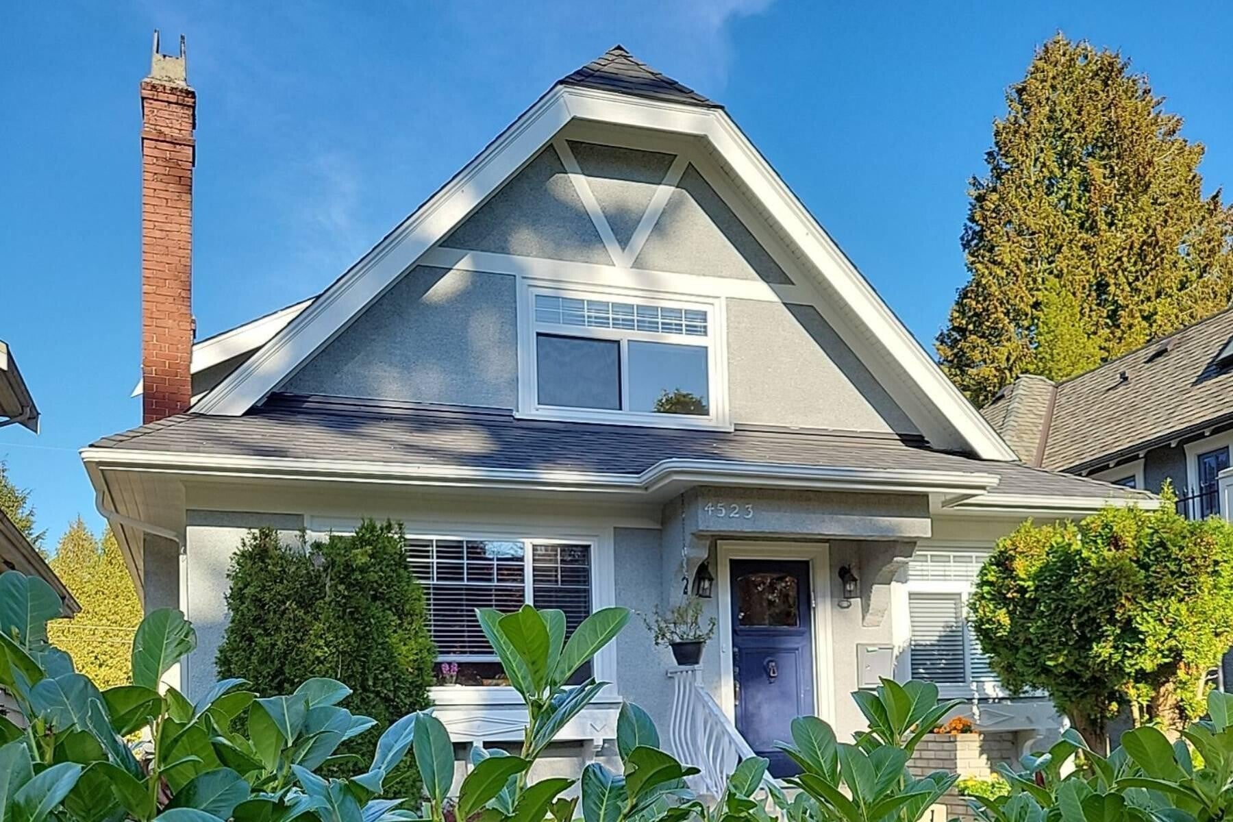 Exterior house painting in Vancouver with freshly painted siding and trim